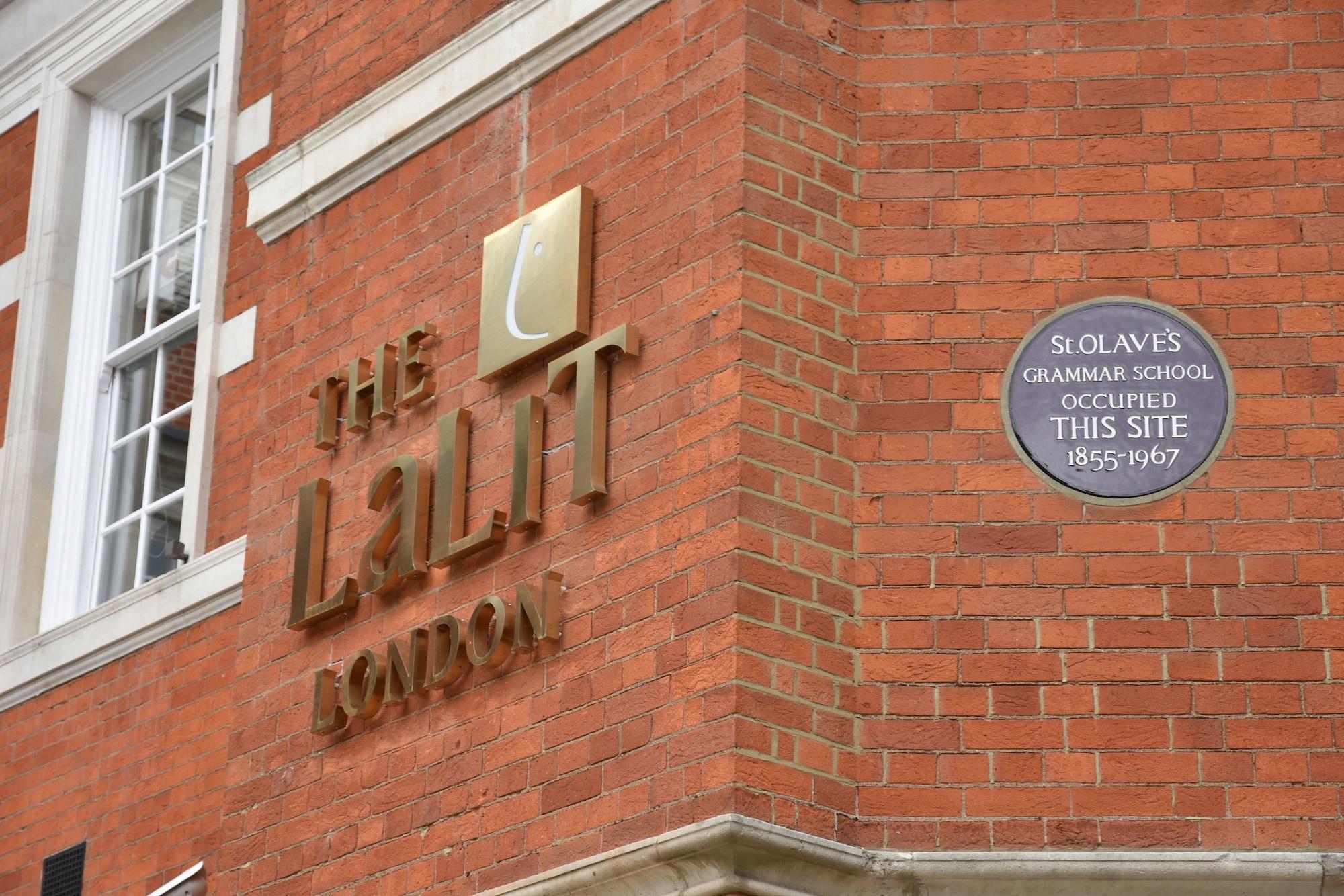 The Lalit London Hotel Exterior photo The UCL logo and the commemorative plaque at the site of the former Soho slave school